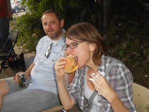 Robin LaMer Rahija and Greg Lamer watching the Rabbit Catastrophe table at the Night Market